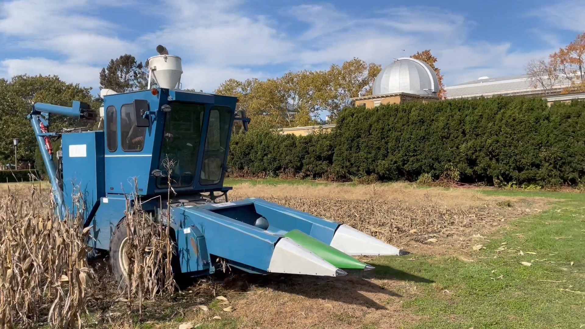 The mini combine at work on the Morrow Plots.